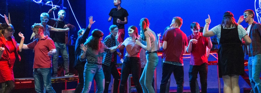 The dance/ball scene in Romeo and Juliet - Lots of people dancing in masks