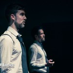 Two men in white shirts and ties