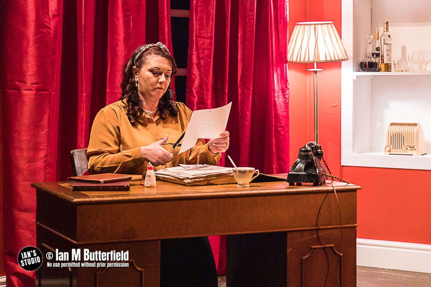 A women sat at a desk